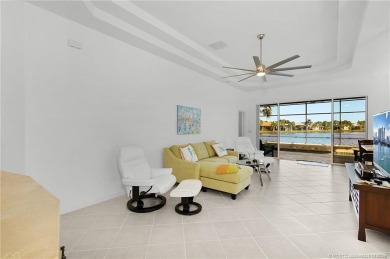 Discover lakefront living in this beautifully updated 3-bedroom on Eagle Marsh Golf Club in Florida - for sale on GolfHomes.com, golf home, golf lot