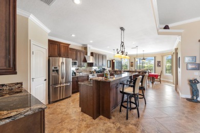 This exceptional waterfront pool home located in the on Sun n Lake Golf and Country Club in Florida - for sale on GolfHomes.com, golf home, golf lot