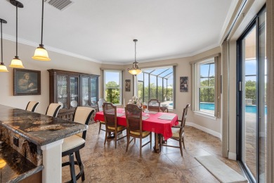 This exceptional waterfront pool home located in the on Sun n Lake Golf and Country Club in Florida - for sale on GolfHomes.com, golf home, golf lot
