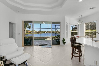 Discover lakefront living in this beautifully updated 3-bedroom on Eagle Marsh Golf Club in Florida - for sale on GolfHomes.com, golf home, golf lot