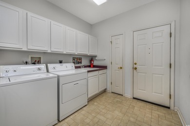 Discover the perfect family retreat in this spacious, one-level on Tidewater Golf Club and Plantation in South Carolina - for sale on GolfHomes.com, golf home, golf lot