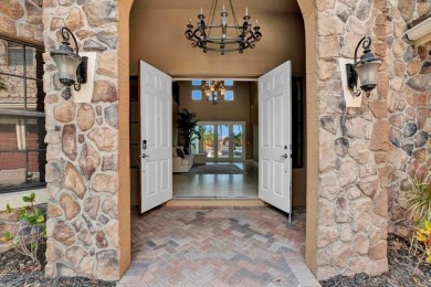 Welcome to your Gorgeous Lakeside Retreat in stunning on Wycliffe Golf and Country Club in Florida - for sale on GolfHomes.com, golf home, golf lot