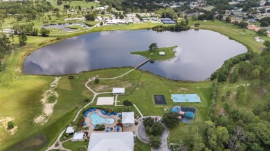 This exceptional waterfront pool home located in the on Sun n Lake Golf and Country Club in Florida - for sale on GolfHomes.com, golf home, golf lot