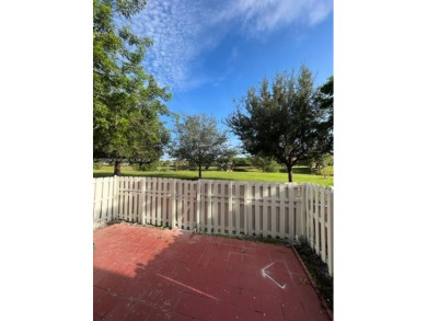 Large townhome with great outdoor space and lake front view! 4 on Country Club of Miami in Florida - for sale on GolfHomes.com, golf home, golf lot