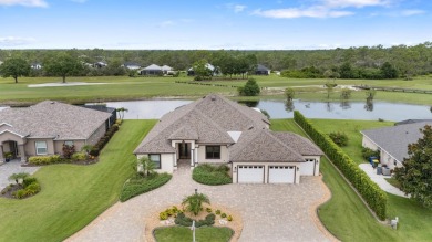 This exceptional waterfront pool home located in the on Sun n Lake Golf and Country Club in Florida - for sale on GolfHomes.com, golf home, golf lot