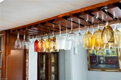 Welcome to this well-maintained 3-bedroom, 2-bath single-family on Hibiscus Golf Club in Florida - for sale on GolfHomes.com, golf home, golf lot