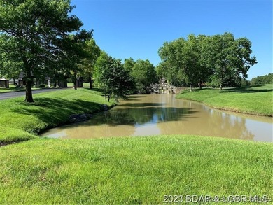 Dreams really do come true! Be a part of Margaritaville Lake on The Oaks Golf Course in Missouri - for sale on GolfHomes.com, golf home, golf lot