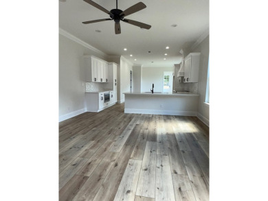 This CUSTOM built Modern New Orleans style shotgun home has 3 on Millbrook Country Club in Mississippi - for sale on GolfHomes.com, golf home, golf lot