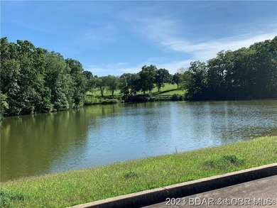 Dreams really do come true! Be a part of Margaritaville Lake on The Oaks Golf Course in Missouri - for sale on GolfHomes.com, golf home, golf lot