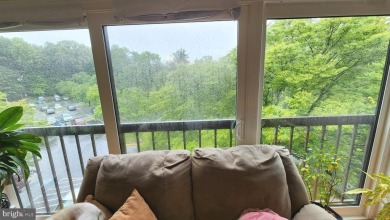 For your downsizing pleasure---a perfect corner unit away from on Leisure World Golf Club in Maryland - for sale on GolfHomes.com, golf home, golf lot