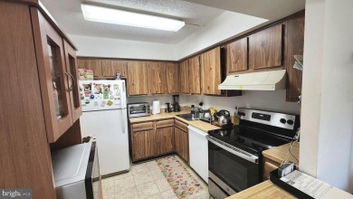 For your downsizing pleasure---a perfect corner unit away from on Leisure World Golf Club in Maryland - for sale on GolfHomes.com, golf home, golf lot