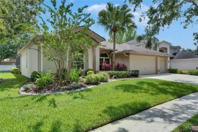Welcome to luxury living at its finest in the highly sought on Hunters Green Country Club in Florida - for sale on GolfHomes.com, golf home, golf lot