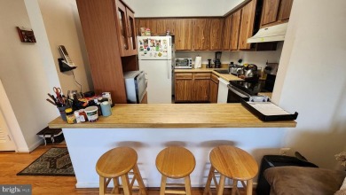 For your downsizing pleasure---a perfect corner unit away from on Leisure World Golf Club in Maryland - for sale on GolfHomes.com, golf home, golf lot