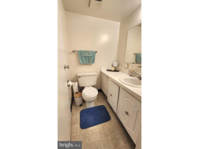 For your downsizing pleasure---a perfect corner unit away from on Leisure World Golf Club in Maryland - for sale on GolfHomes.com, golf home, golf lot