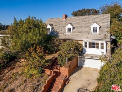 Set privately above the street in a premier Cheviot Hills on Rancho Park Golf Course in California - for sale on GolfHomes.com, golf home, golf lot