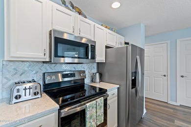 Experience effortless coastal luxury in this beautifully on Members Club At St. James Plantation in North Carolina - for sale on GolfHomes.com, golf home, golf lot