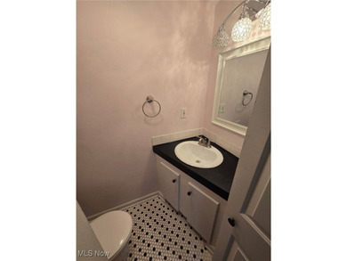 This charming ranch, nestled along a golf course just down the on Lake Forest Country Club in Ohio - for sale on GolfHomes.com, golf home, golf lot