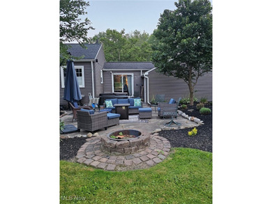 This charming ranch, nestled along a golf course just down the on Lake Forest Country Club in Ohio - for sale on GolfHomes.com, golf home, golf lot