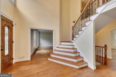 Stunning 5-Bedroom Home in Towne Lake Hills North - on Towne Lake Hills Golf Club in Georgia - for sale on GolfHomes.com, golf home, golf lot