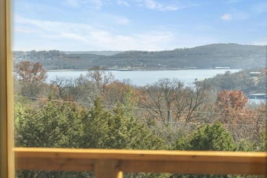 Situated on two massive water view lots in stunning & convenient on Kimberling City Golf Club in Missouri - for sale on GolfHomes.com, golf home, golf lot