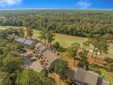 Beautiful townhouse with stunning views of the 18th hole on the on Diamondhead Country Club in Mississippi - for sale on GolfHomes.com, golf home, golf lot