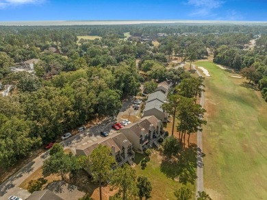 Beautiful townhouse with stunning views of the 18th hole on the on Diamondhead Country Club in Mississippi - for sale on GolfHomes.com, golf home, golf lot
