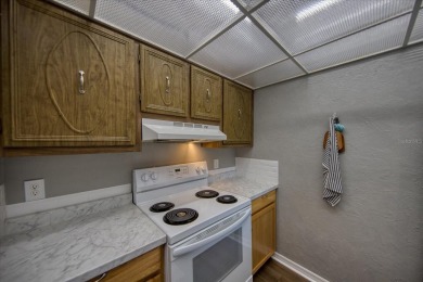 FABULOUS Cordova Green in highly desirable Bardmoor community on Bayou Golf Club in Florida - for sale on GolfHomes.com, golf home, golf lot