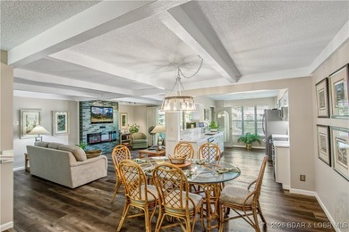 The location at Water's Edge everyone wants. A walk in unit with on Seasons Ridge At Four Seasons in Missouri - for sale on GolfHomes.com, golf home, golf lot