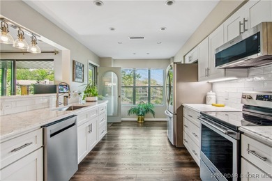 The location at Water's Edge everyone wants. A walk in unit with on Seasons Ridge At Four Seasons in Missouri - for sale on GolfHomes.com, golf home, golf lot