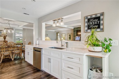 The location at Water's Edge everyone wants. A walk in unit with on Seasons Ridge At Four Seasons in Missouri - for sale on GolfHomes.com, golf home, golf lot