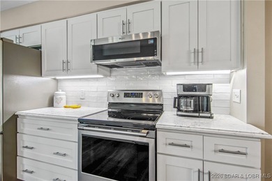 The location at Water's Edge everyone wants. A walk in unit with on Seasons Ridge At Four Seasons in Missouri - for sale on GolfHomes.com, golf home, golf lot