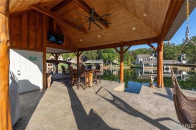 Stunning Waterfront Atrium Ranch with 4 bedrooms, 3 full baths on Raintree Country Club in Missouri - for sale on GolfHomes.com, golf home, golf lot