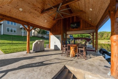 Stunning Waterfront Atrium Ranch with 4 bedrooms, 3 full baths on Raintree Country Club in Missouri - for sale on GolfHomes.com, golf home, golf lot