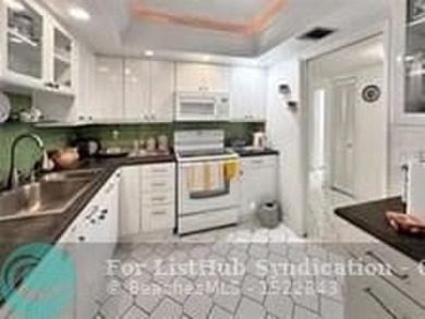 Discover your dream home in this bright and airy third-floor on Palm-Aire Country Club and Resort - Palms in Florida - for sale on GolfHomes.com, golf home, golf lot