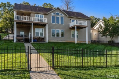 Stunning Waterfront Atrium Ranch with 4 bedrooms, 3 full baths on Raintree Country Club in Missouri - for sale on GolfHomes.com, golf home, golf lot