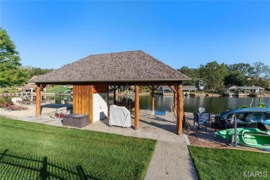 Stunning Waterfront Atrium Ranch with 4 bedrooms, 3 full baths on Raintree Country Club in Missouri - for sale on GolfHomes.com, golf home, golf lot