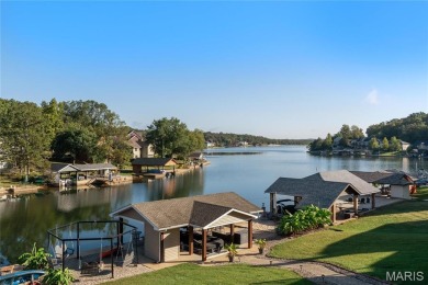 Stunning Waterfront Atrium Ranch with 4 bedrooms, 3 full baths on Raintree Country Club in Missouri - for sale on GolfHomes.com, golf home, golf lot