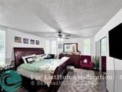 Discover your dream home in this bright and airy third-floor on Palm-Aire Country Club and Resort - Palms in Florida - for sale on GolfHomes.com, golf home, golf lot