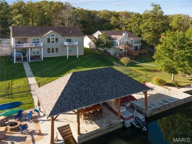 Stunning Waterfront Atrium Ranch with 4 bedrooms, 3 full baths on Raintree Country Club in Missouri - for sale on GolfHomes.com, golf home, golf lot