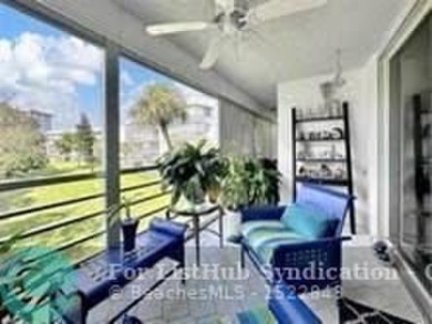 Discover your dream home in this bright and airy third-floor on Palm-Aire Country Club and Resort - Palms in Florida - for sale on GolfHomes.com, golf home, golf lot
