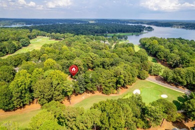 WELCOME TO THIS CHARMING COTTAGE NESTLED IN THE SOUGHT-AFTER on Great Waters Course At Reynolds Plantation in Georgia - for sale on GolfHomes.com, golf home, golf lot