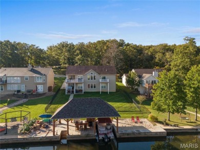 Stunning Waterfront Atrium Ranch with 4 bedrooms, 3 full baths on Raintree Country Club in Missouri - for sale on GolfHomes.com, golf home, golf lot