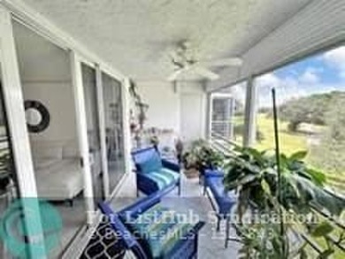 Discover your dream home in this bright and airy third-floor on Palm-Aire Country Club and Resort - Palms in Florida - for sale on GolfHomes.com, golf home, golf lot
