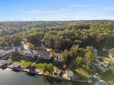 Stunning Waterfront Atrium Ranch with 4 bedrooms, 3 full baths on Raintree Country Club in Missouri - for sale on GolfHomes.com, golf home, golf lot