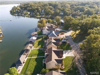 Stunning Waterfront Atrium Ranch with 4 bedrooms, 3 full baths on Raintree Country Club in Missouri - for sale on GolfHomes.com, golf home, golf lot