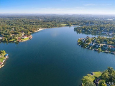 Stunning Waterfront Atrium Ranch with 4 bedrooms, 3 full baths on Raintree Country Club in Missouri - for sale on GolfHomes.com, golf home, golf lot