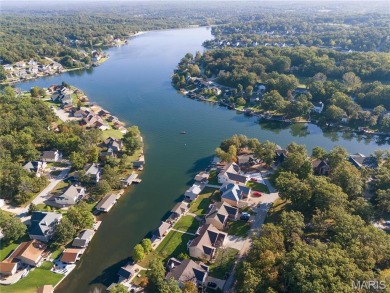 Stunning Waterfront Atrium Ranch with 4 bedrooms, 3 full baths on Raintree Country Club in Missouri - for sale on GolfHomes.com, golf home, golf lot