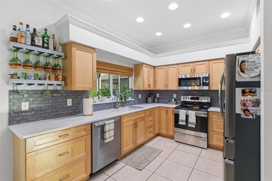 Searching for a stunning pool home in an exceptional on Heritage Harbor Golf and Country Club in Florida - for sale on GolfHomes.com, golf home, golf lot