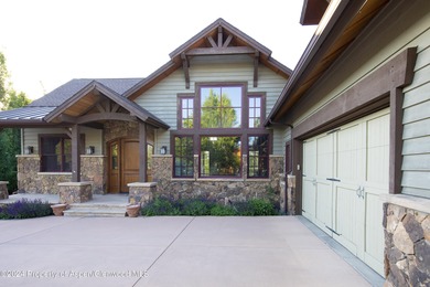 Light and bright mountain custom home with spectacular sunset on River Valley Ranch Golf Club in Colorado - for sale on GolfHomes.com, golf home, golf lot
