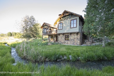 Light and bright mountain custom home with spectacular sunset on River Valley Ranch Golf Club in Colorado - for sale on GolfHomes.com, golf home, golf lot